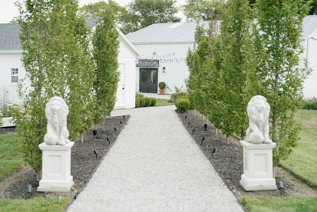 Garden pathway leading through Aspen & Alston wedding venue in Ohio