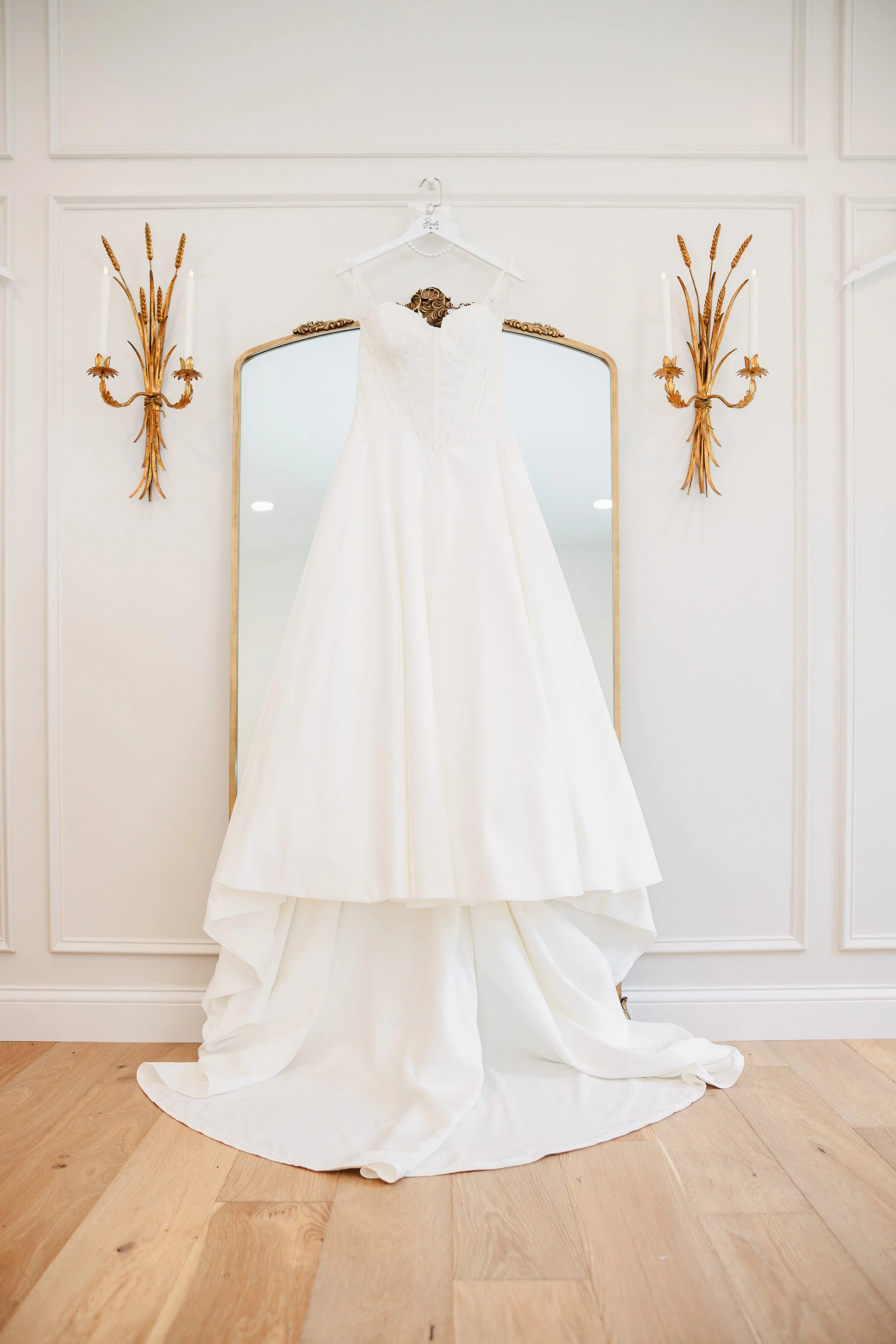 Wedding dress displayed inside the bridal suite at Aspen & Alston wedding venue in Ohio