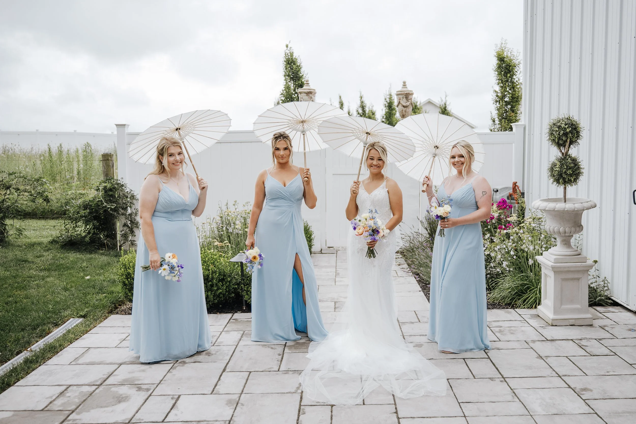 Bridesmaids portraits in the courtyard