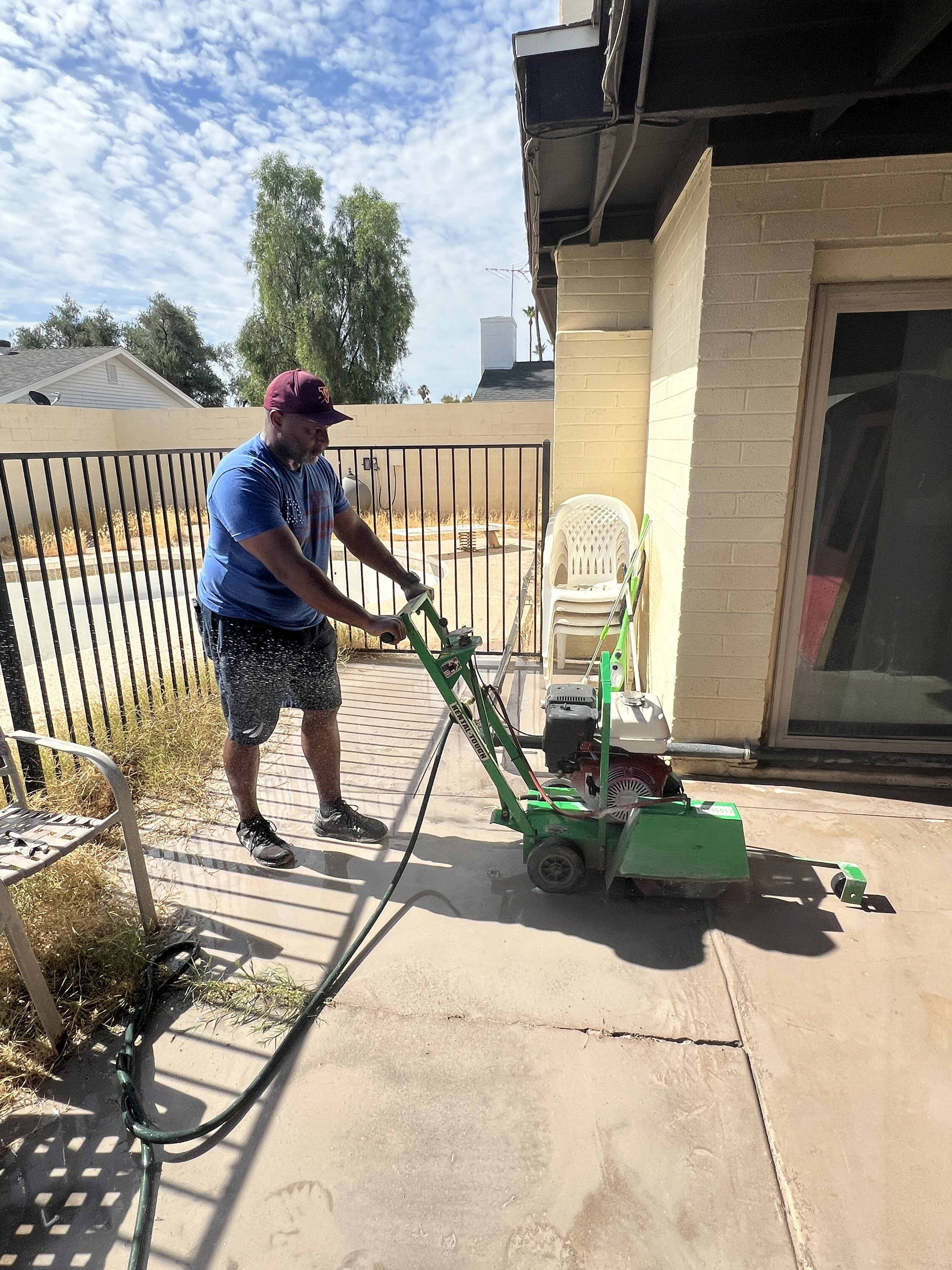Darryl Hawkins cutting the cement