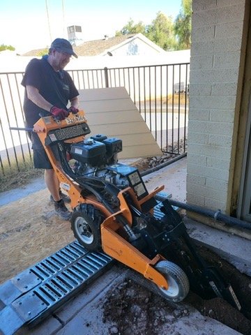 Jeff Working the ditchdigger