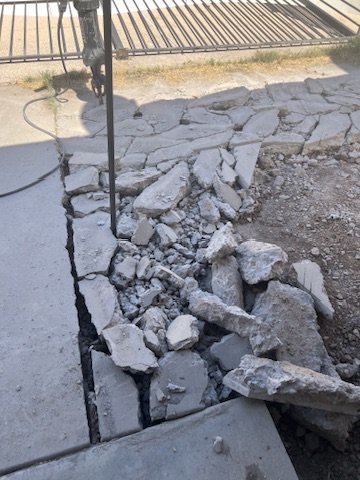 4 -Breaking Cement Pad.jpeg