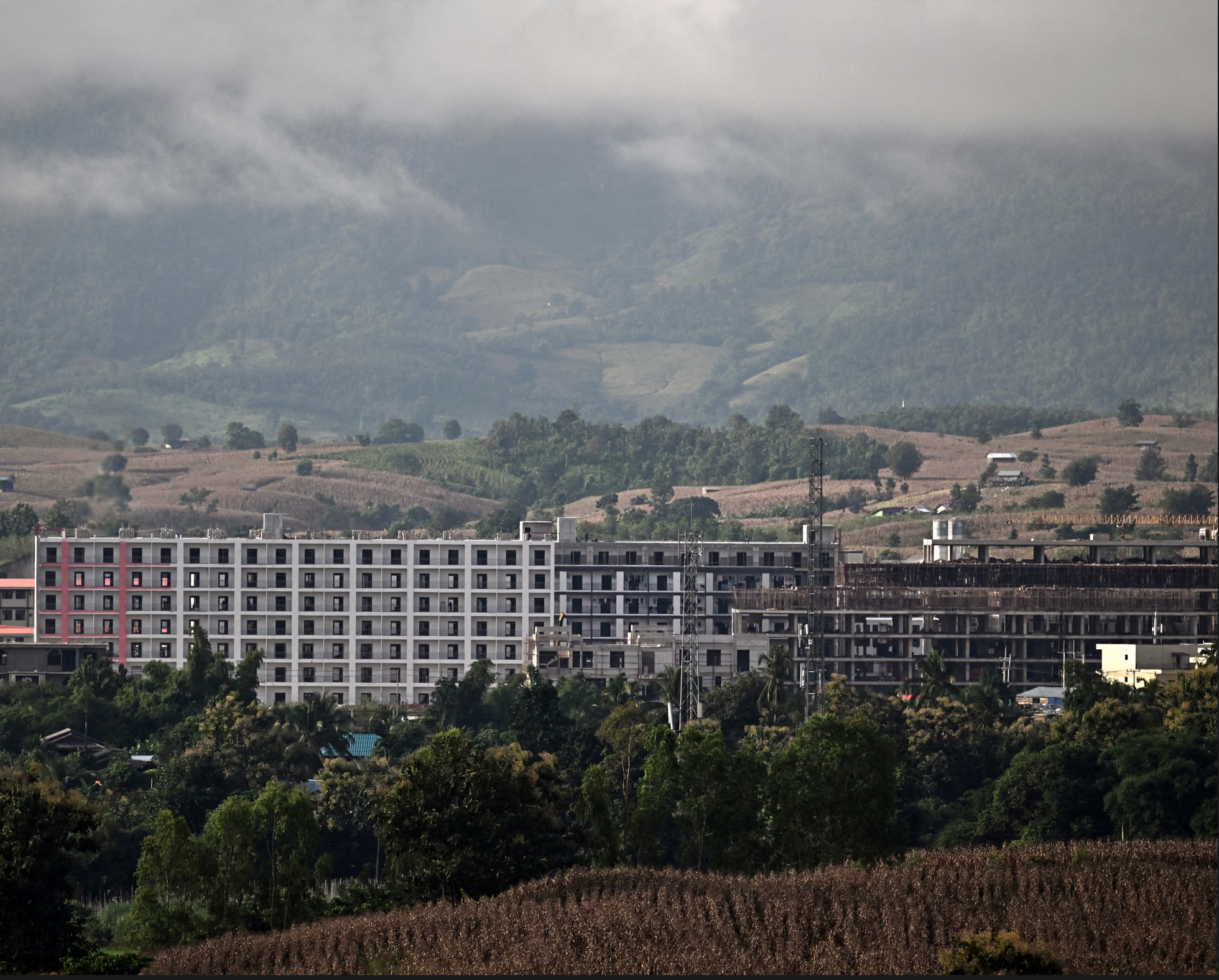 The KK Park complex of buildings with a backdrop of mountains in Myanmar's eastern Myawaddy township, taken from Mae Sot, Thailand, in September 2025.