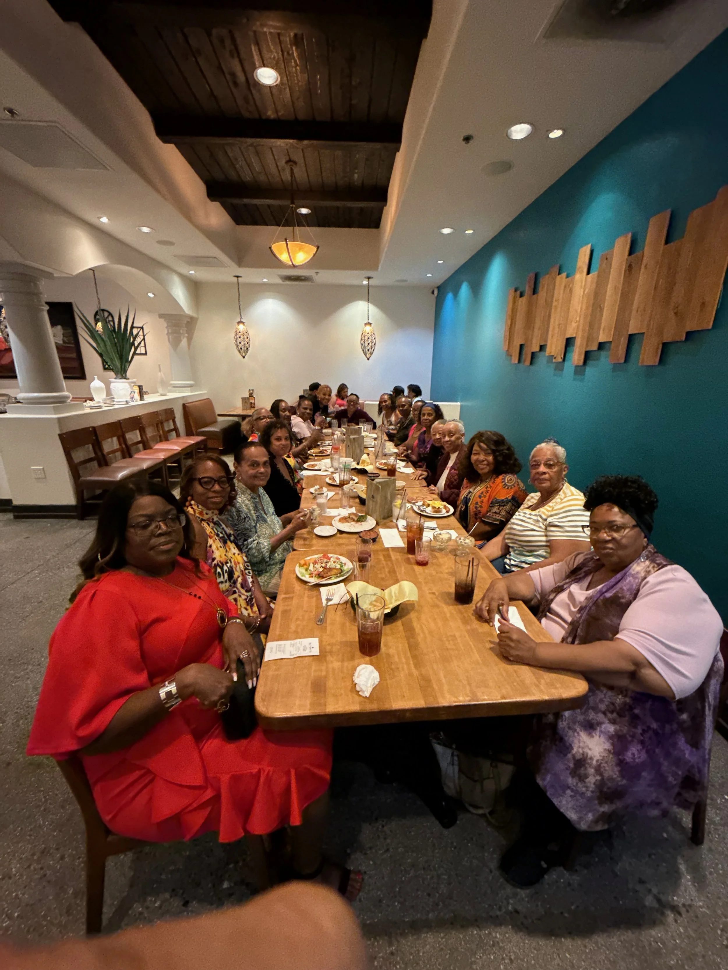 Sistering members sharing a meal together at the retreat
