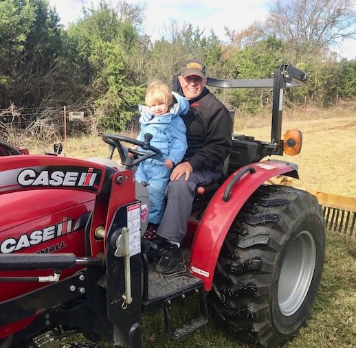 seb_and_papa_in_tx_on_tractor.jpg