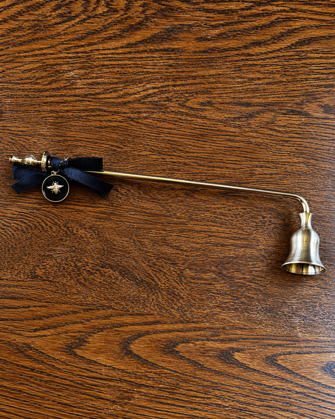 Brass Candle Snuffer with Bee Charm.png