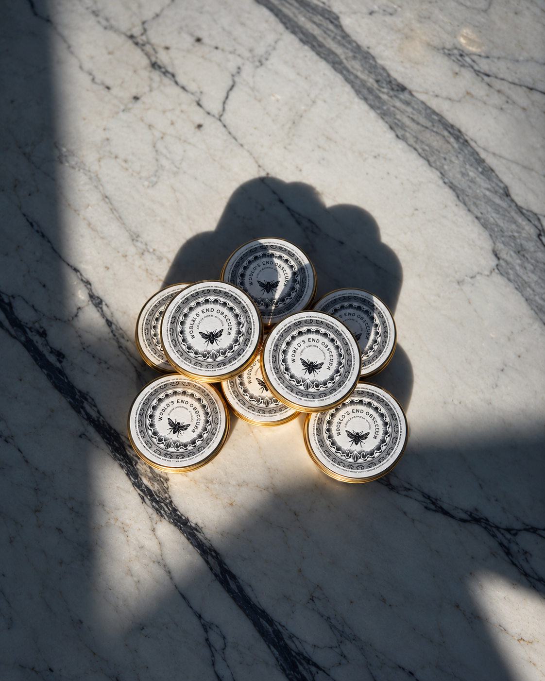 Golden Tin Cluster on Sunlit Marble.png