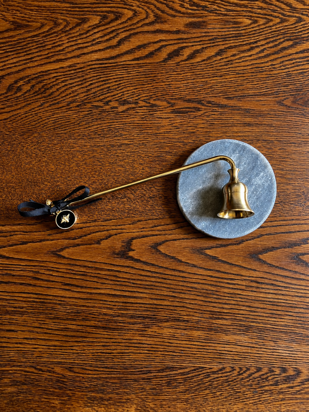 Brass Bell and Bee Medallion on Wood.png