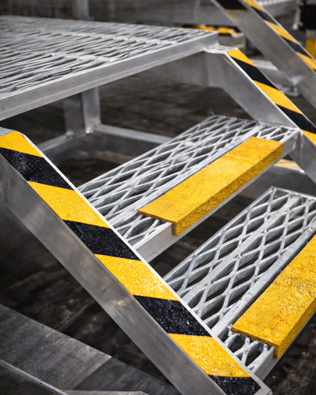 Close-up of Liebherr machinery with Ricbuilt Heavy industries manufactured Handrails on a mining site.