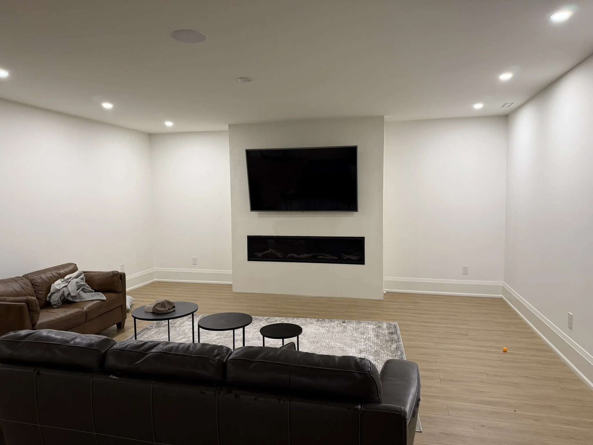 micro-cement-basement-tv-feature-wall.jpg