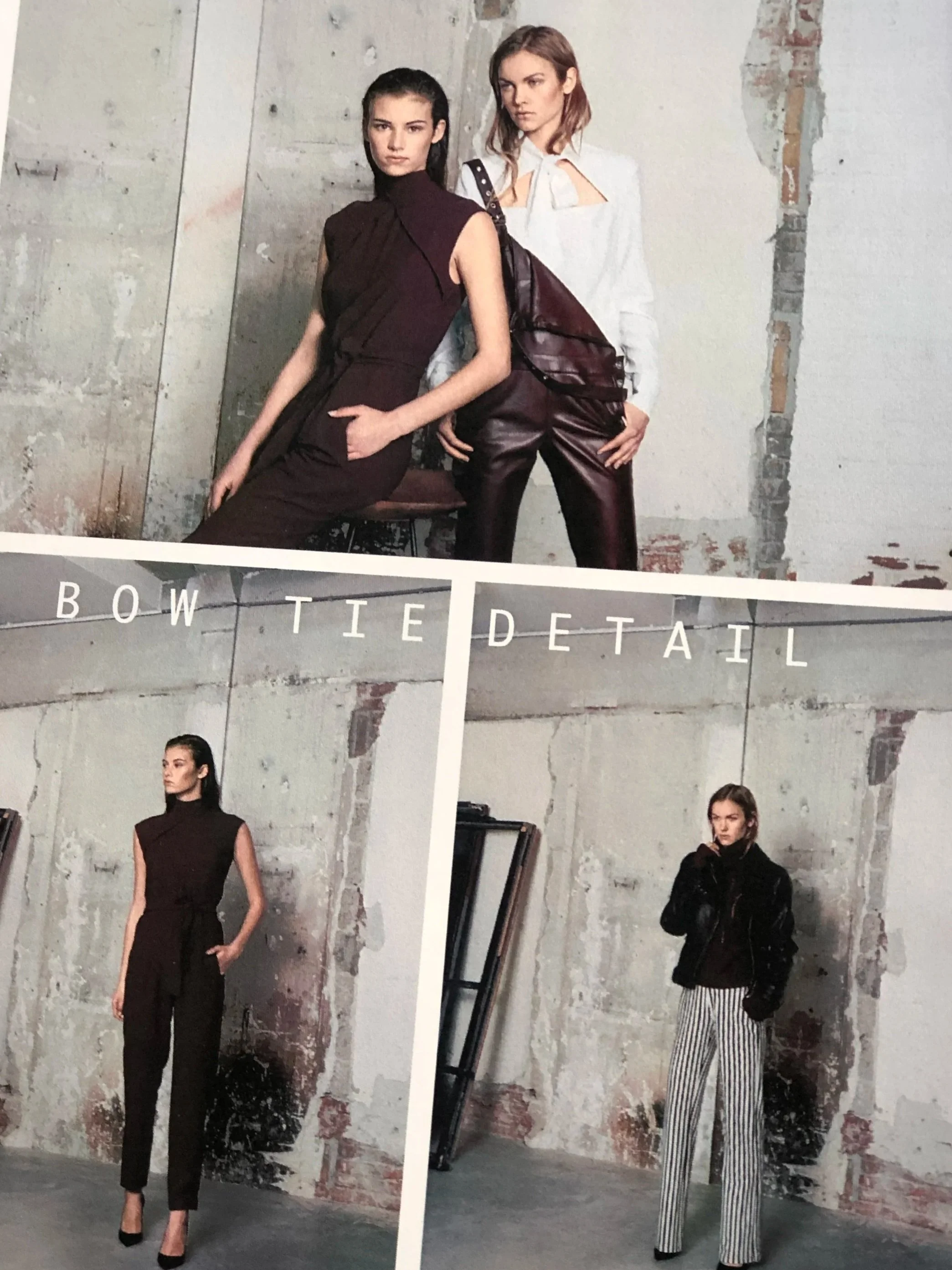 Drei Frauen in modischer Kleidung in einem industriellen Raum. Die erste Frau trägt ein schwarzes Kleid, die zweite trägt eine weiße Bluse und braune Lederhosen, die dritte trägt ein schwarzes Top und schwarze und weiße Streifenhose.