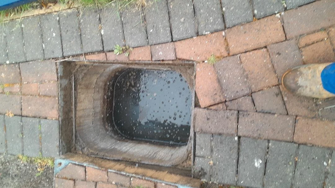 Unblocking the manhole has restored flow to the ground floor toilet and wash basin.