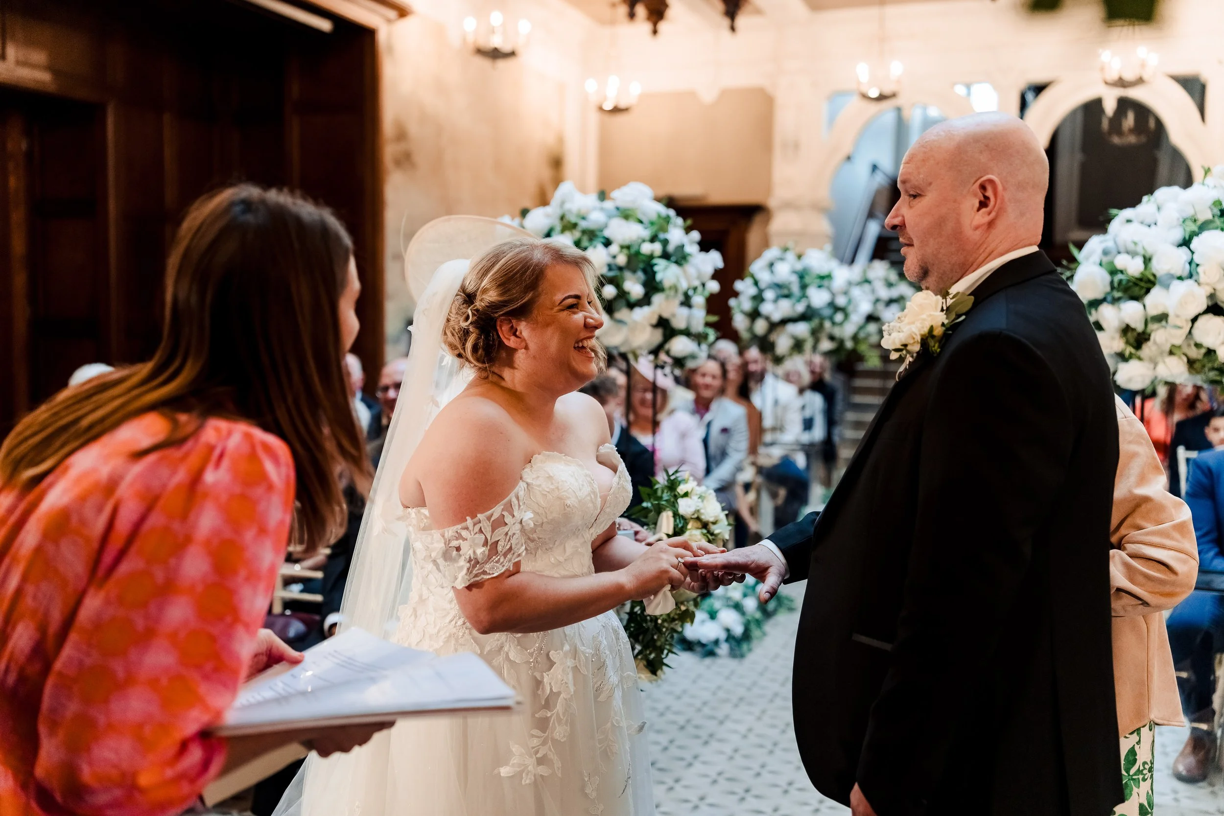 Couple smiling during their celebrant-led wedding ceremony at Clevedon Hall, Bristol