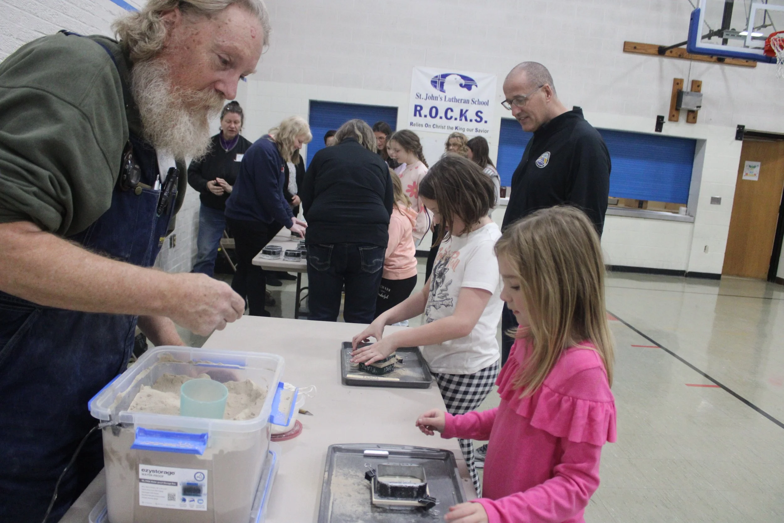 students packing castings