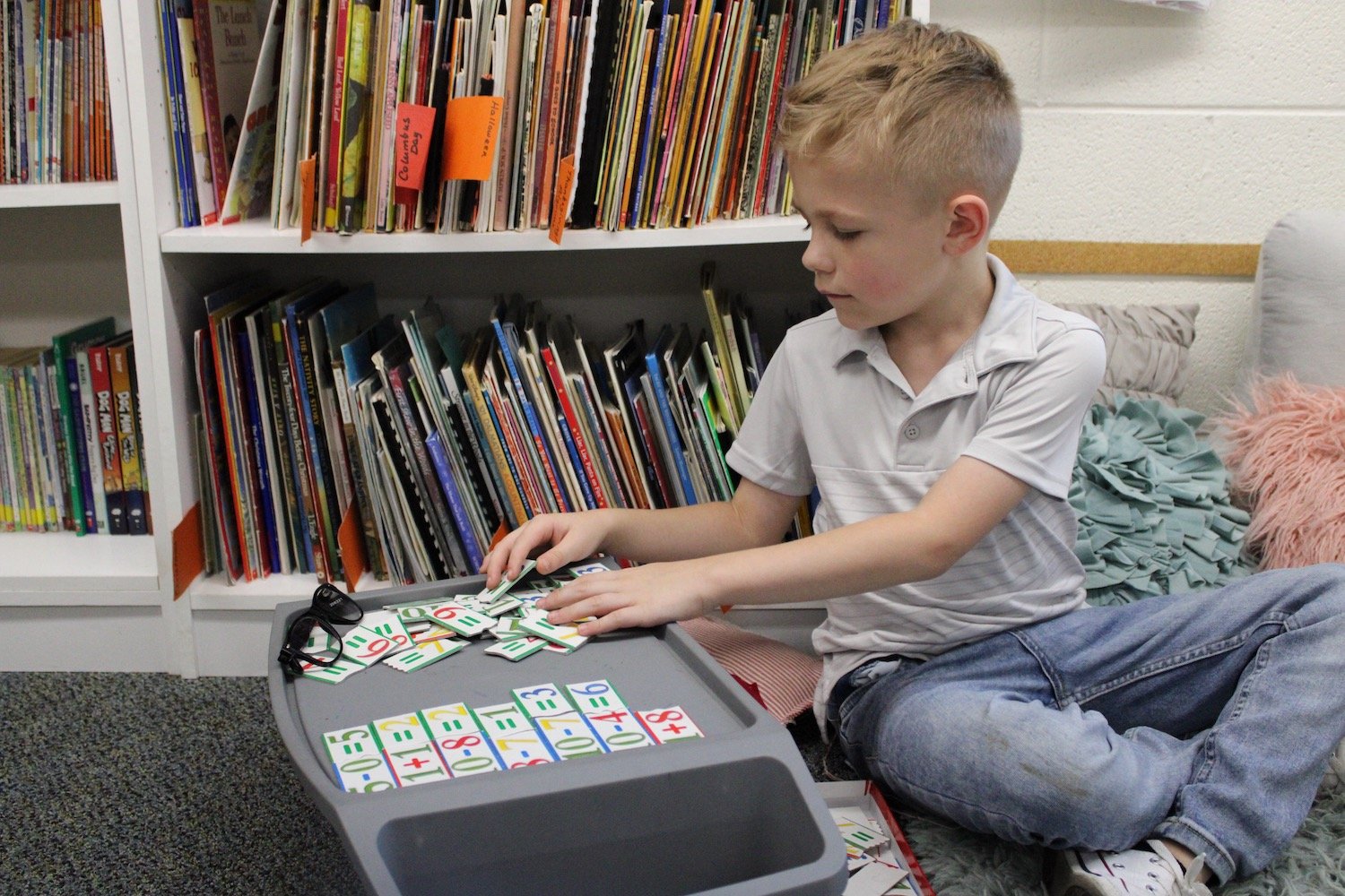 Student using math flash cards