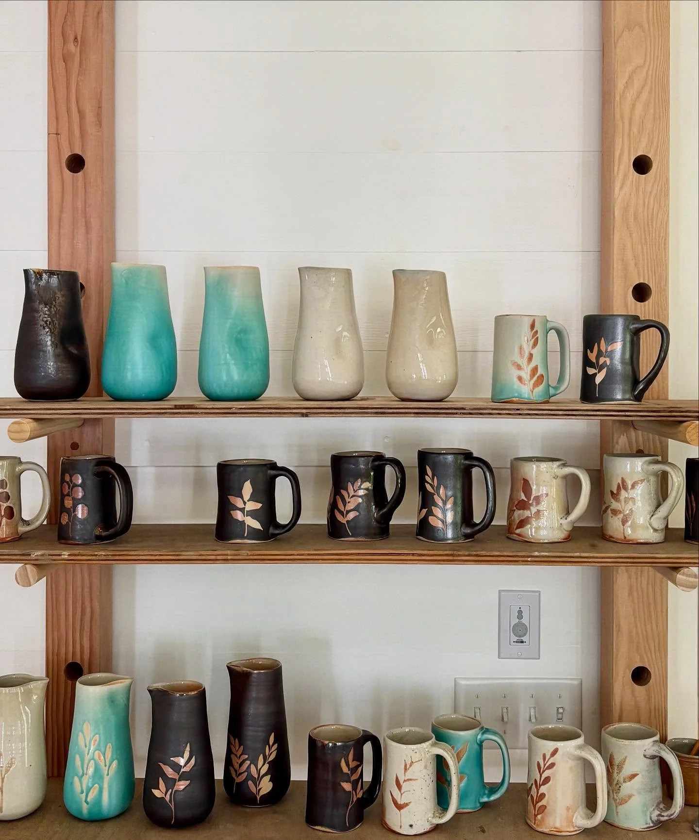 Studio scenes: 1) new pieces fired over the summer

2) hand sewed a curtain for my beautiful new/old sink 

3) fermenting crocks + weights drying

4) hung a mirror + a drying rack in this happy corner near my beautiful window by @daybreaksglassstudio