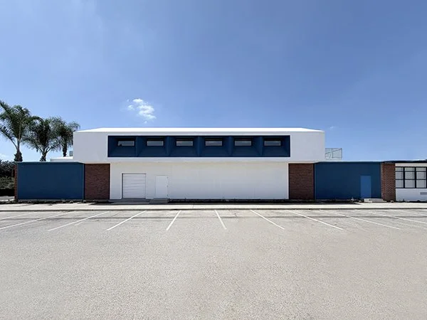 Private High School Theater overhang and windows