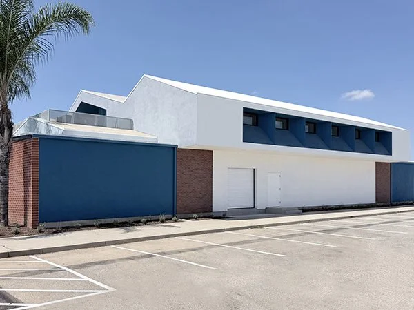 Private High School Theater roof cantilever and windows