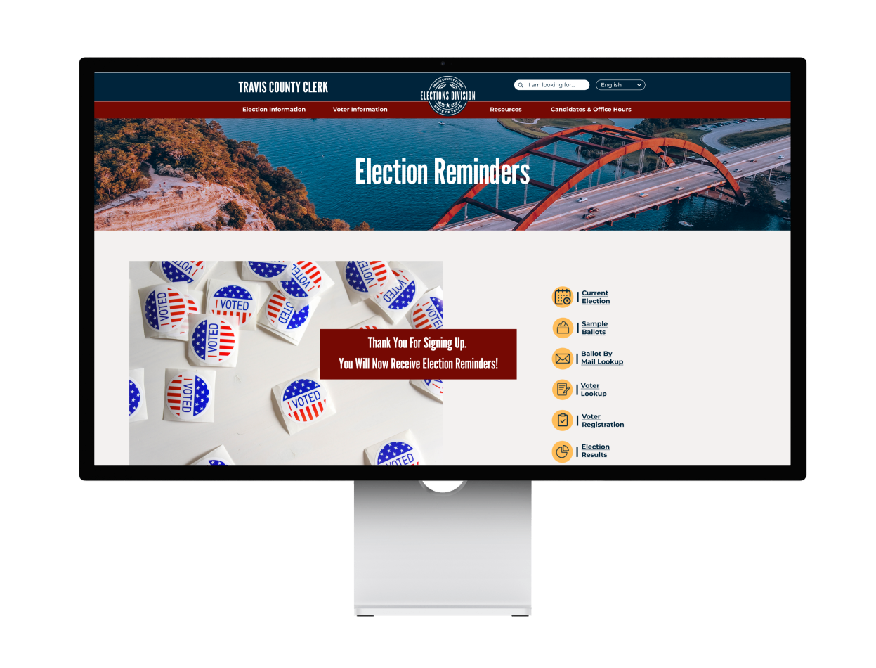 A computer monitor displaying a website titled 'Travis County Clerk' with election reminders, featuring a background image of a bridge over a body of water and Halloween-themed 'I Voted' stickers on a white surface.