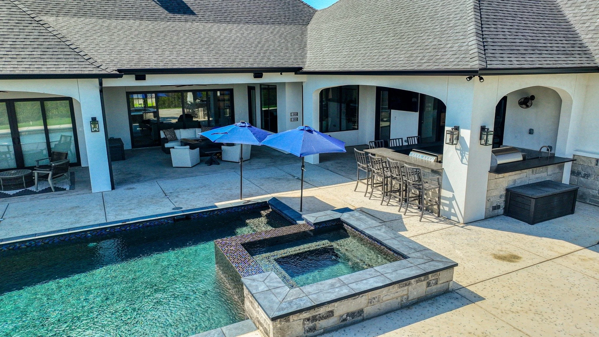 Let us know in the comments, which detail would you enjoy most? 

The pool, the spa, the outdoor kitchen, or the covered patio? This space was designed so every corner has a purpose.

Make the most of your space when you build with John Askew Custom 