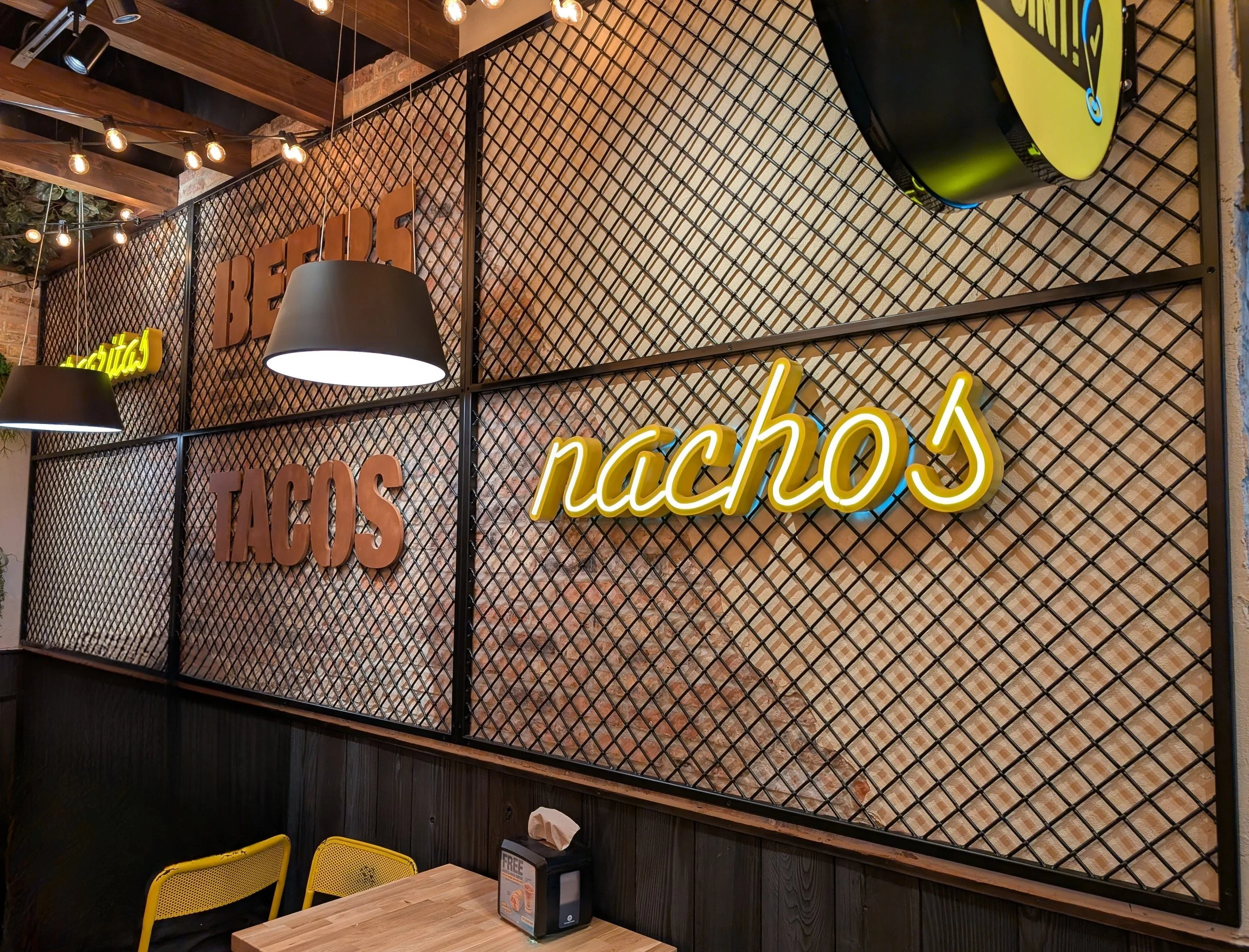 Metal mesh wall display detail, custom fabricated by Vero for GYG Bucktown