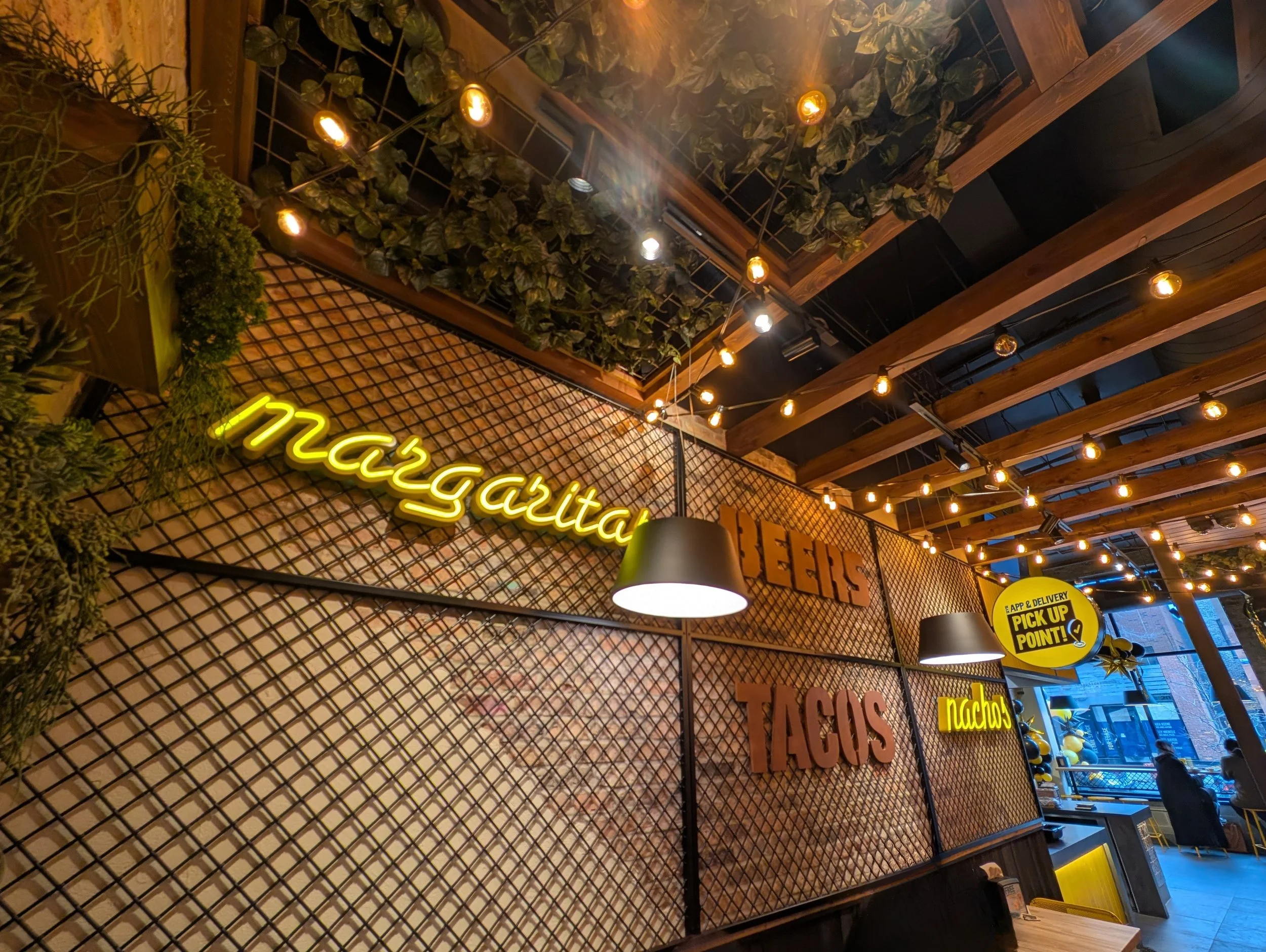 Steel mesh display wall feature, fabricated by Vero, for Guzman Y Gomez in Bucktown