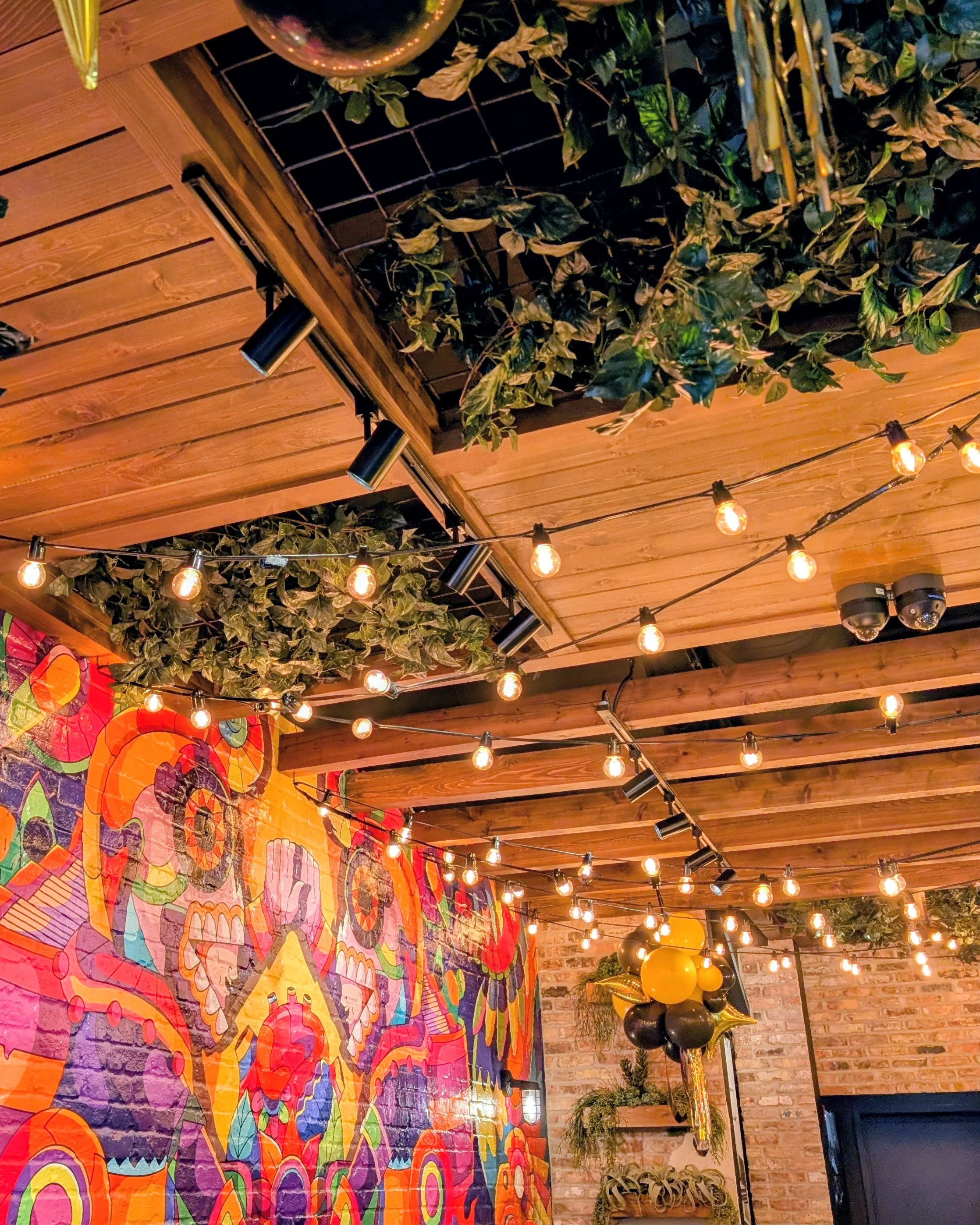 Wood ceiling beams and panels with integrated plant feature, fabricated by Vero for GYG Bucktown