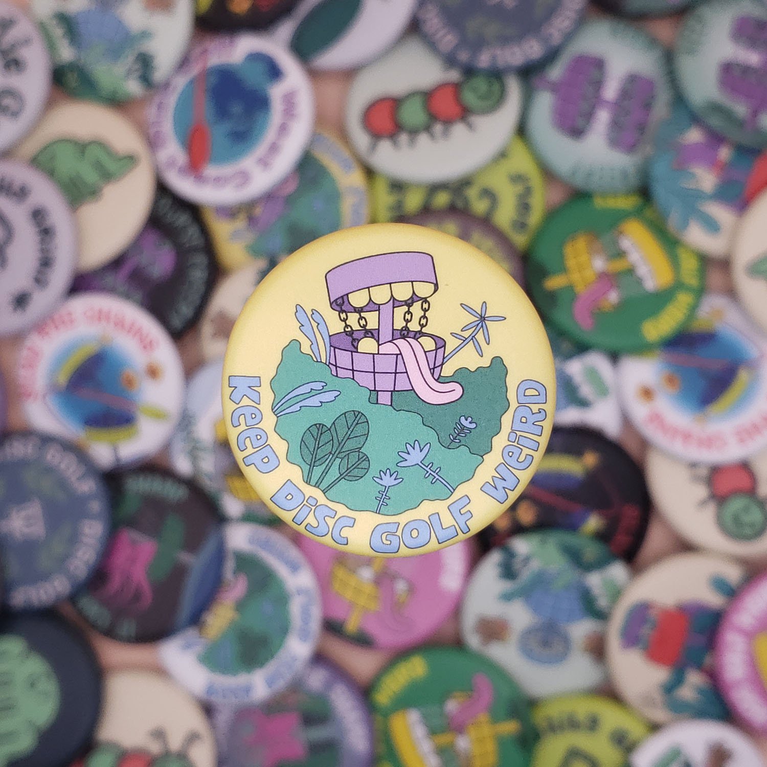 Keep-Disc-Golf-Weird-Yellow-Button (small).jpg