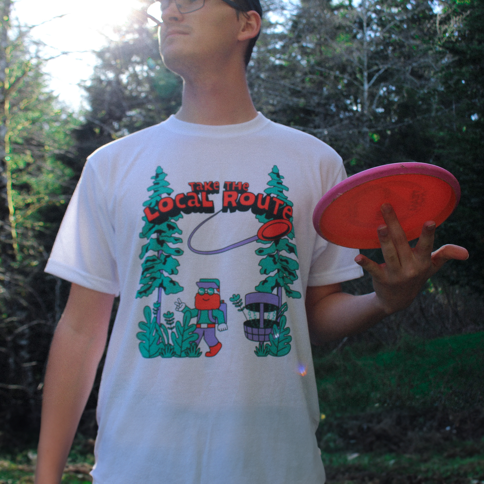 Local Route disc golf shirt on person white.png