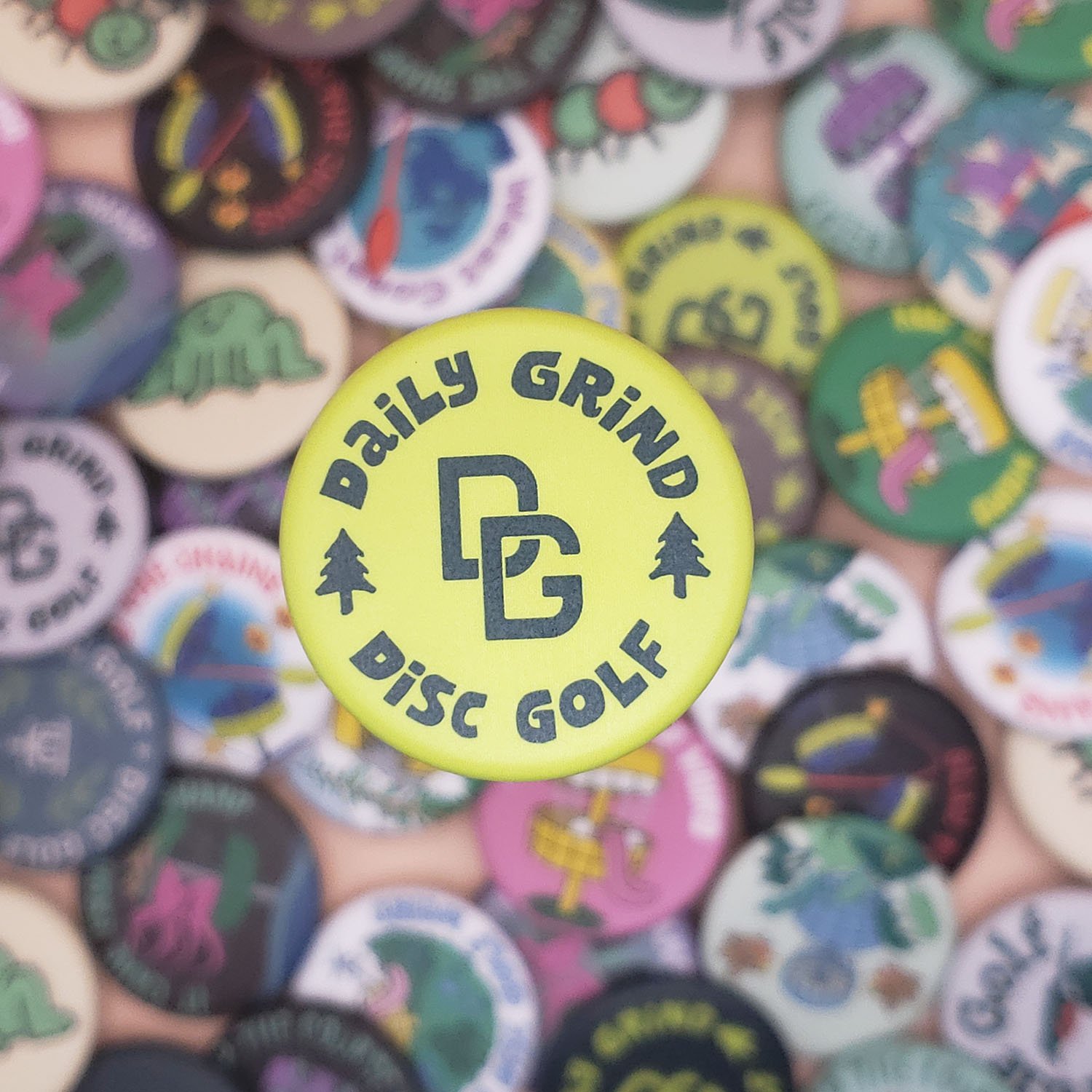 Daily-Grind-Logo-Green-Disc-Golf-Button (small).jpg