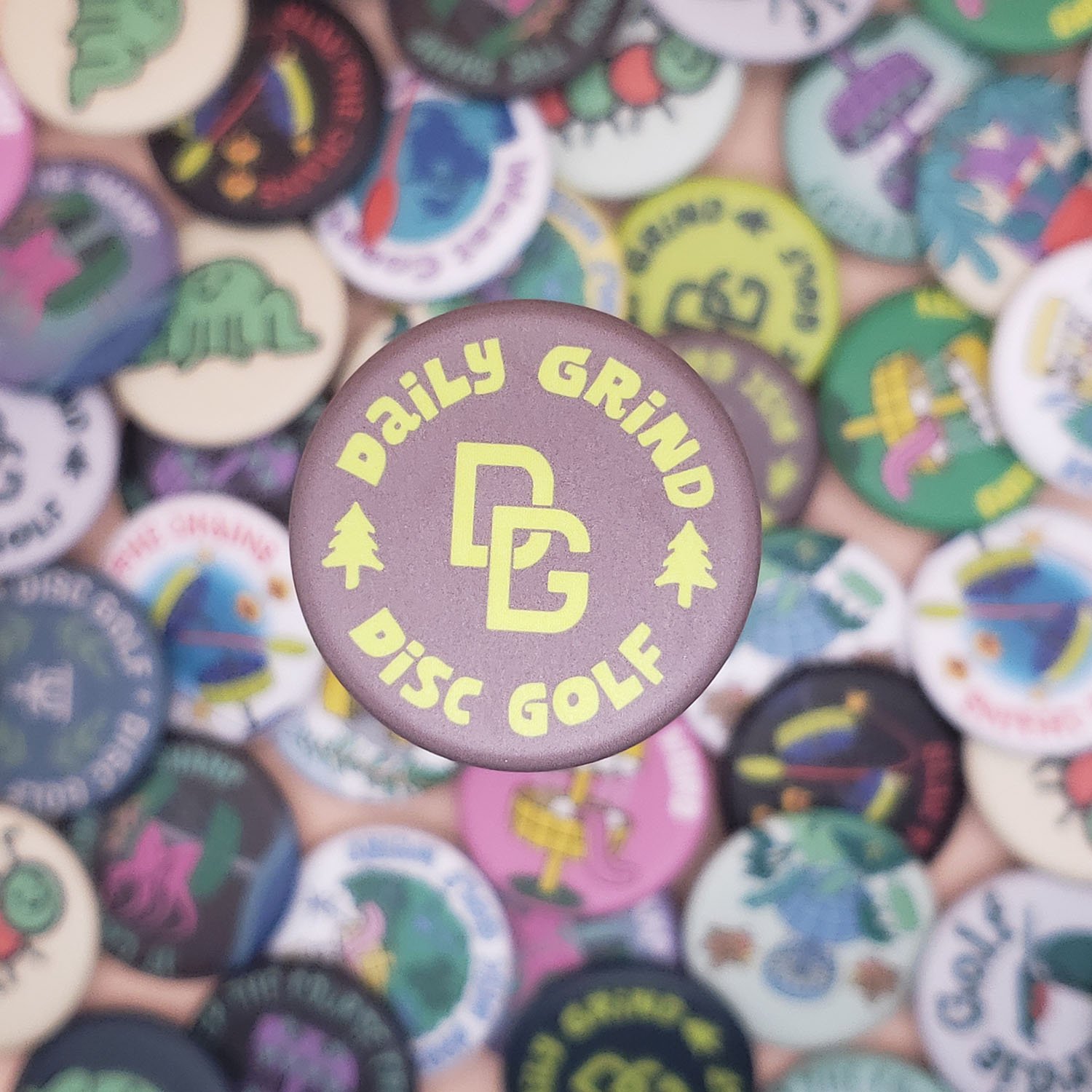Daily-Grind-Logo-Brown-Disc-Golf-Button (small).jpg