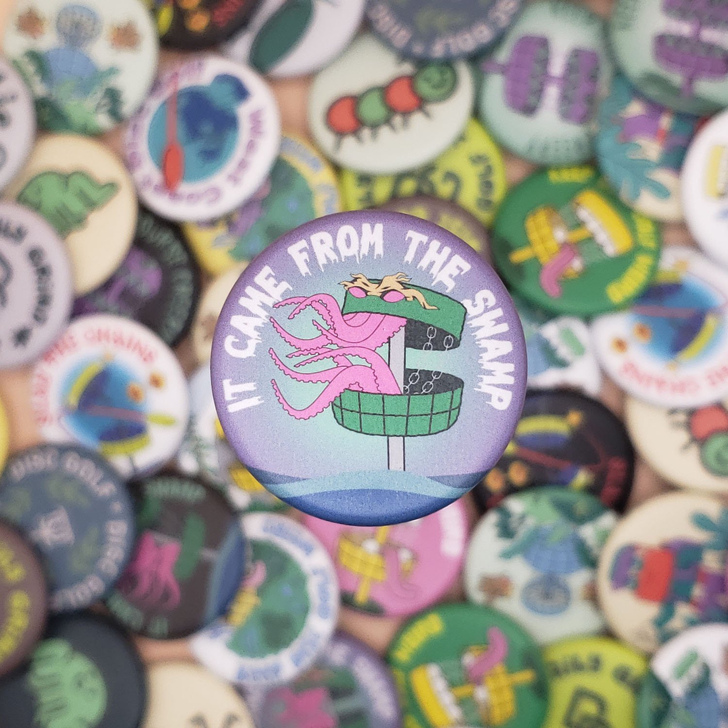 Swamp-Monster-Purple-Disc-Golf-Button (small).jpg