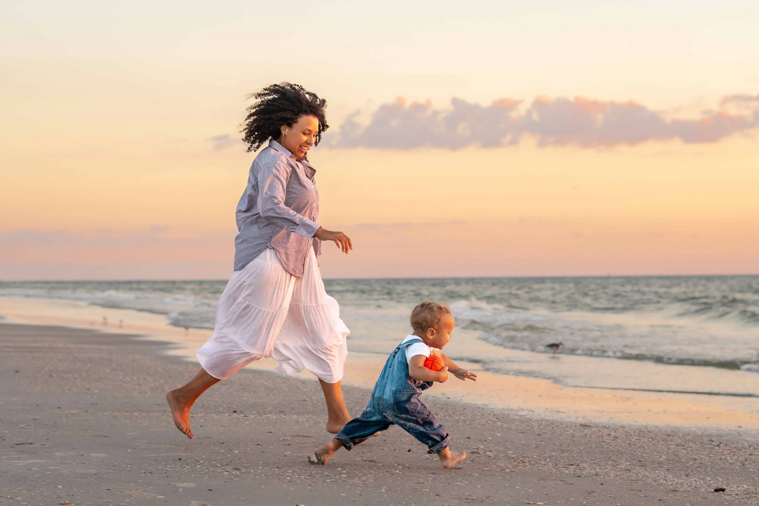 st-pete-florida-family-beach-sunset-mom -and-toddler-boy.jpg