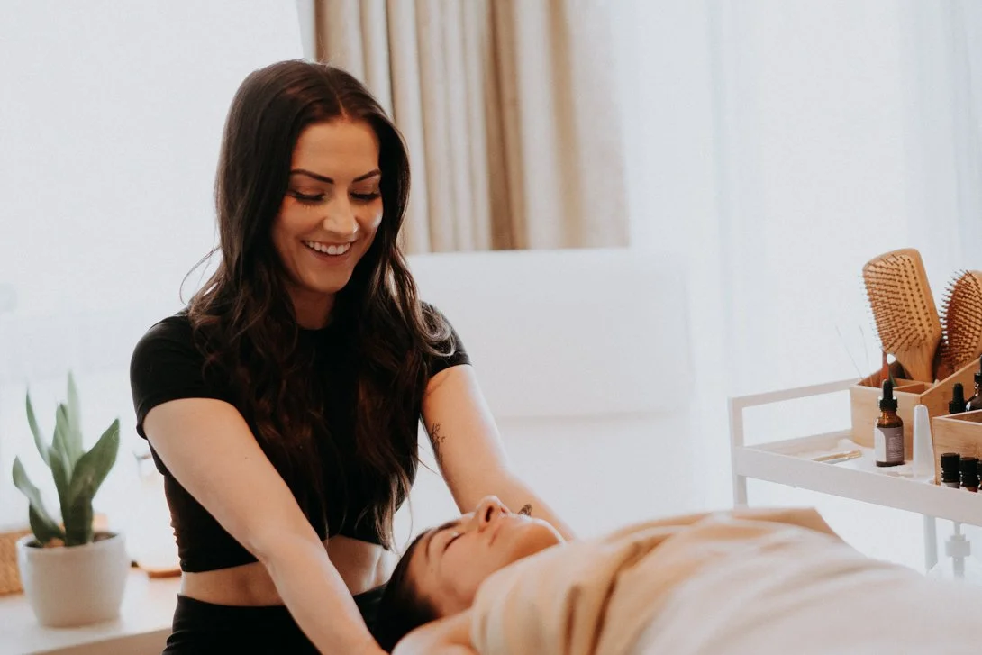 Kowy Ritual soft touch therapy session at Koselig Wellness in Edmonton featuring therapeutic touch and nervous system relaxation care.