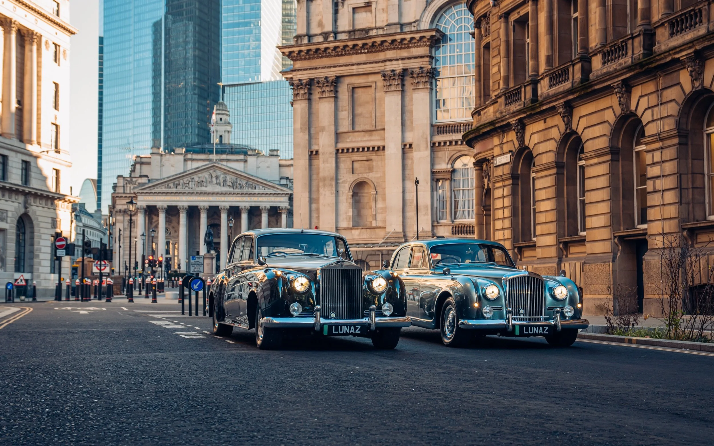 Two Lunaz electrified classic cars in the City of London