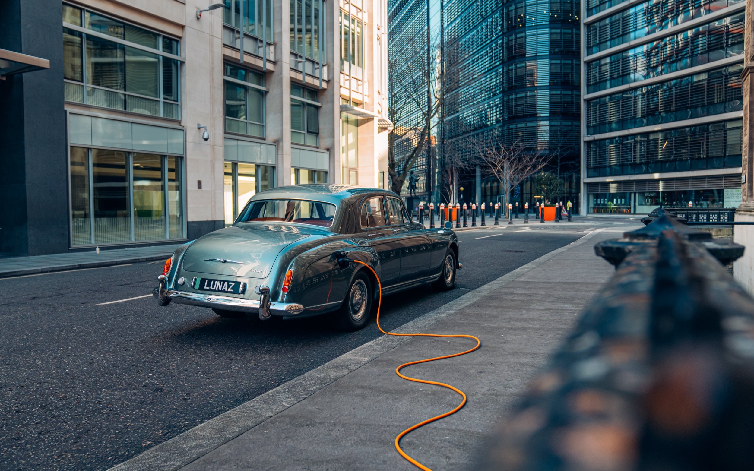 Lunaz electric Bentley charging on a London street