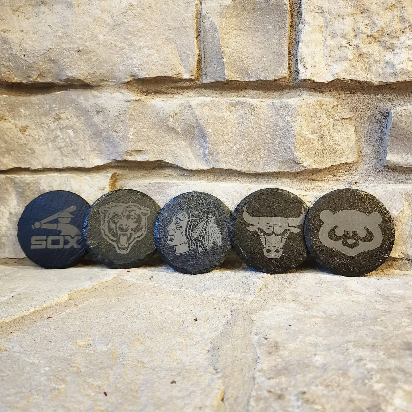 ⚾️🏈🏀🥅🏒I will have two sets of 4 engraved Chicago teams slate coasters at the Holiday Fair on Saturday.

One set will have the Bears, Bulls, Blackhawks, and Cubs logo, and the other set will have the first three teams with the Sell the Team Jerry 