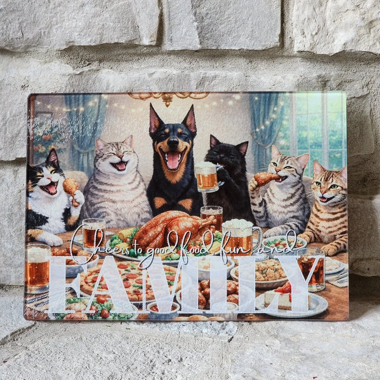 While I lay around and continue recovering from the stomach flu 🤢, please enjoy another late holiday share! I created this gift from photos of the family's 5 cats and one pup, cartoonized them, and then sublimated the image onto a glass cutting boar