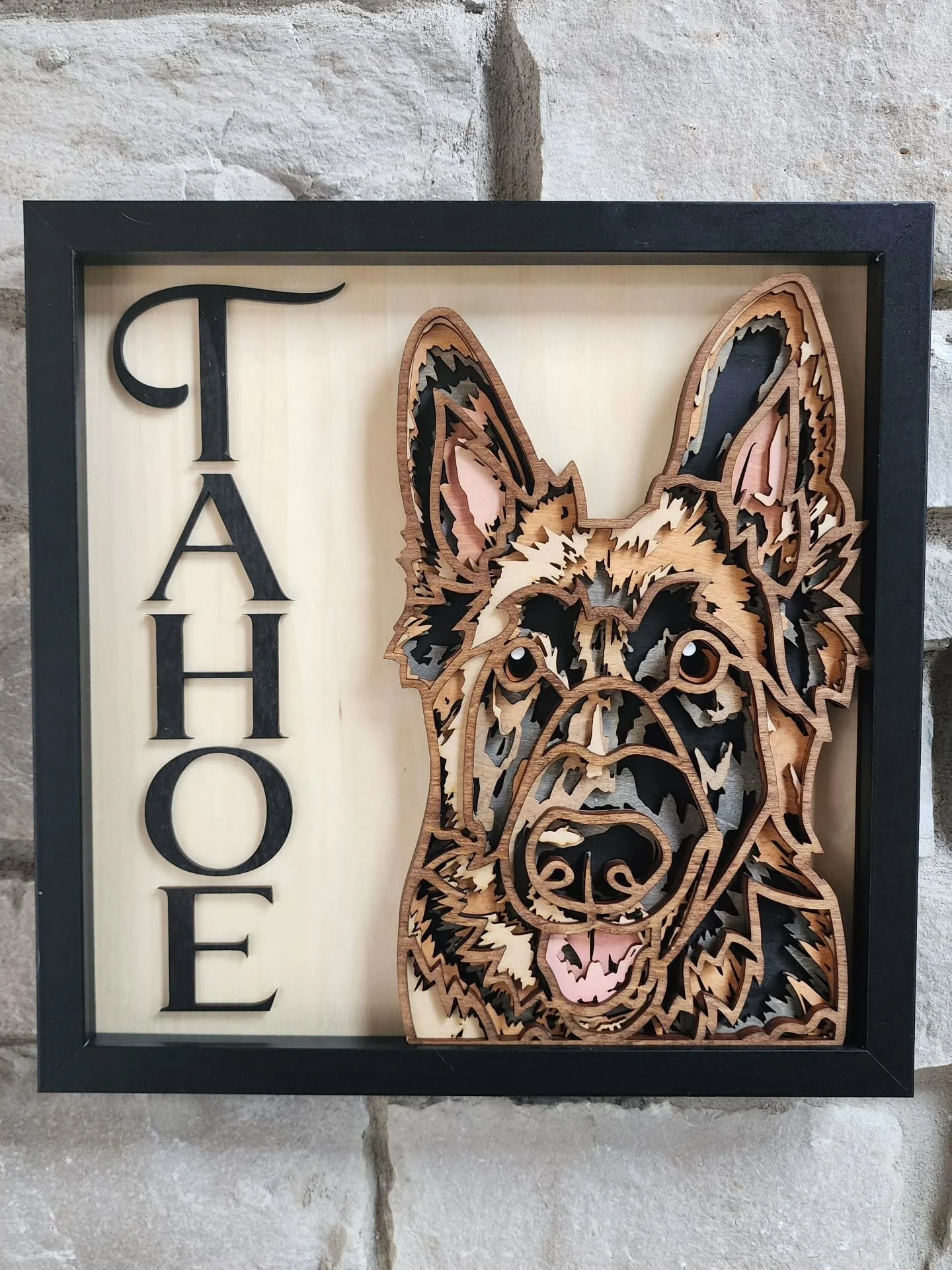 A commissioned custom framed portrait of a very handsome German Shephed puppers 🐾 5 layers of stained, laser cut birch.

#customart #petportraits #woodart #germanshepherd #localart