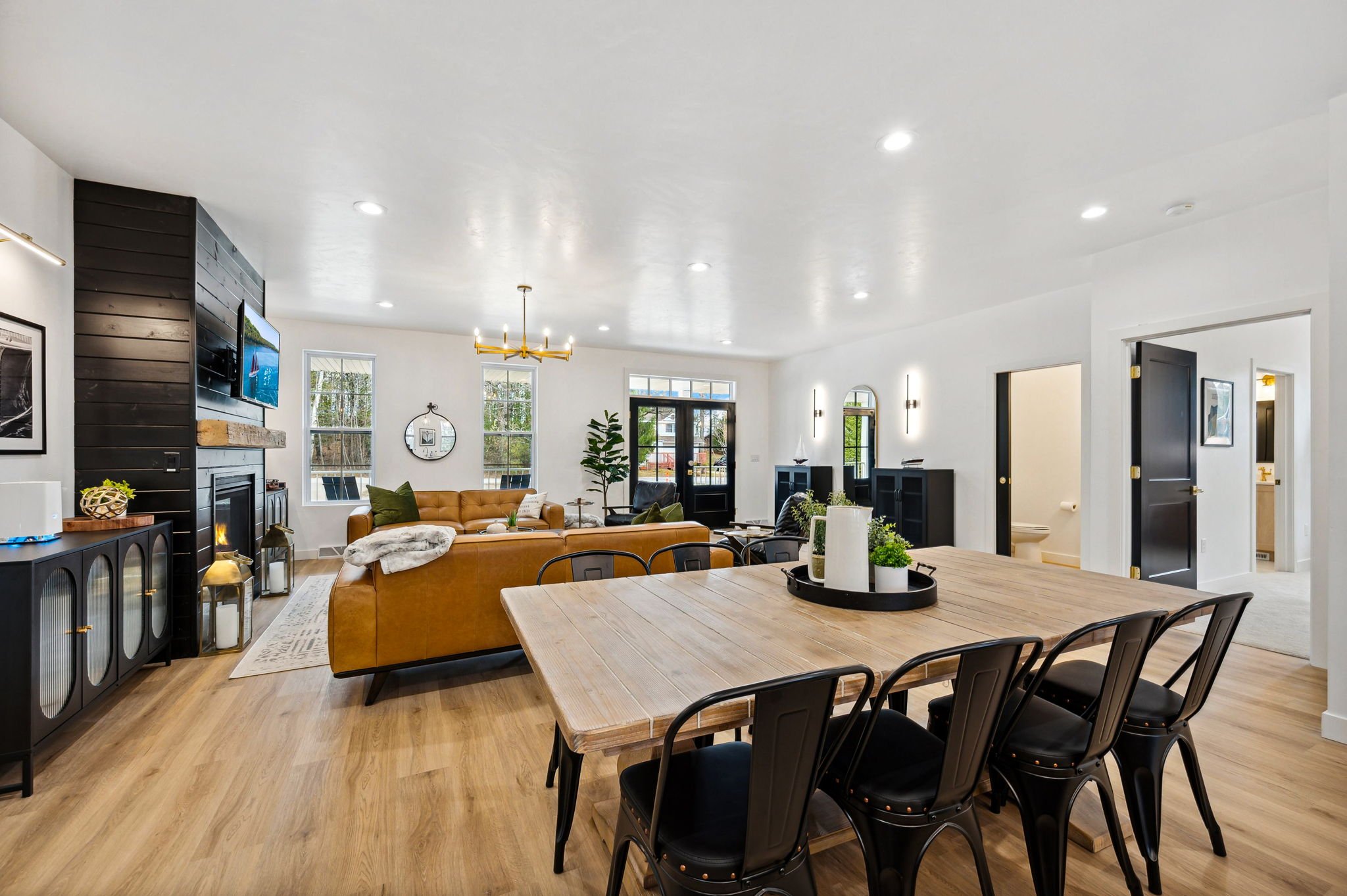 Envision gatherings around the beautiful dining table, just steps from the chef’s kitchen—a space where culinary delights and cherished moments come together. After dinner, it’s perfect for game night, with a selection of board games and cards provid