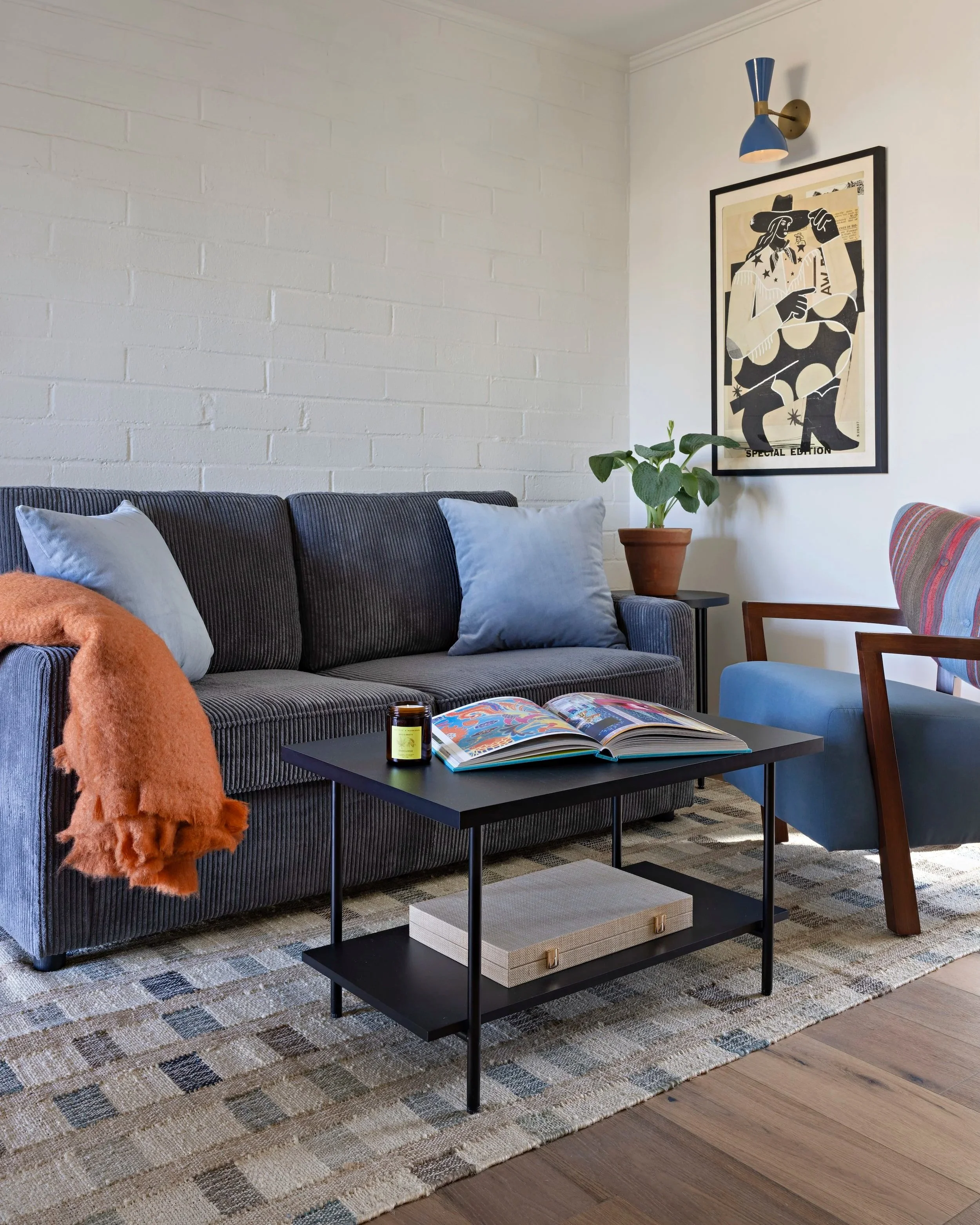 River Lodge Deluxe Suite - Living Room with a Full-Size Pull-Out Sofa Bed.