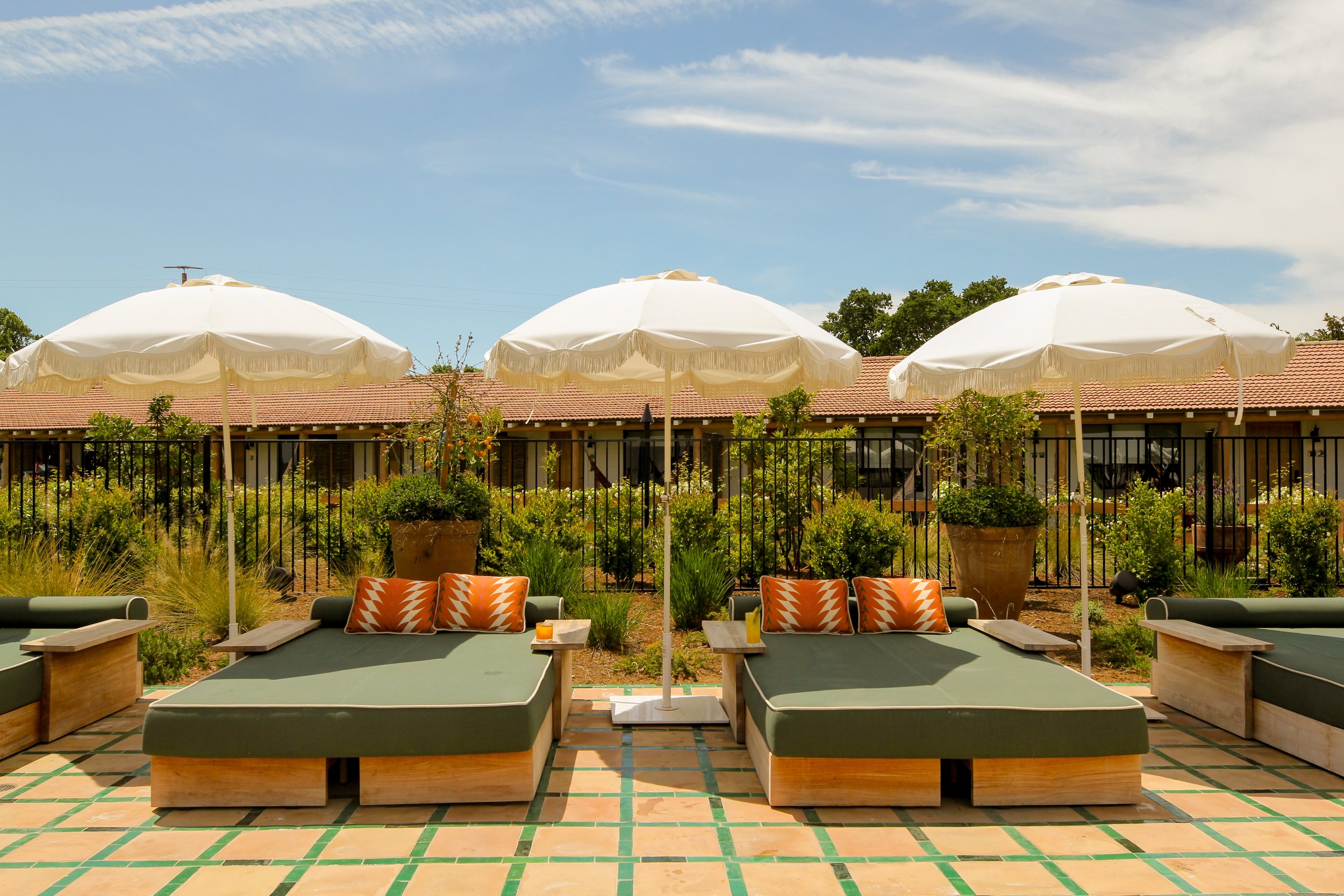 Adults only pool in Paso Robles with daybeds & loungers in the sun.