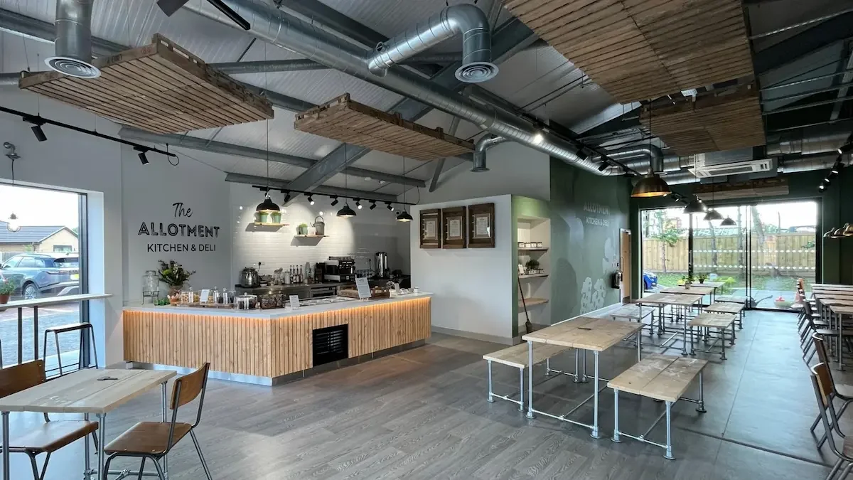 A wide pan image of a cafe named The Allotment Kitchen and Deli