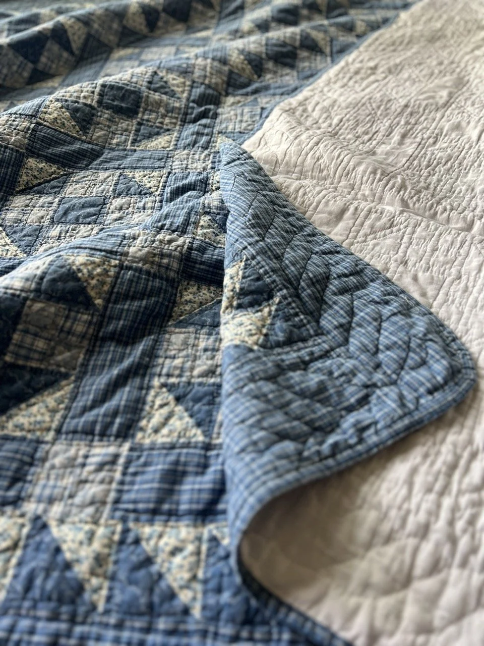 Detail of the hand quilting by Mama's church ladies group.