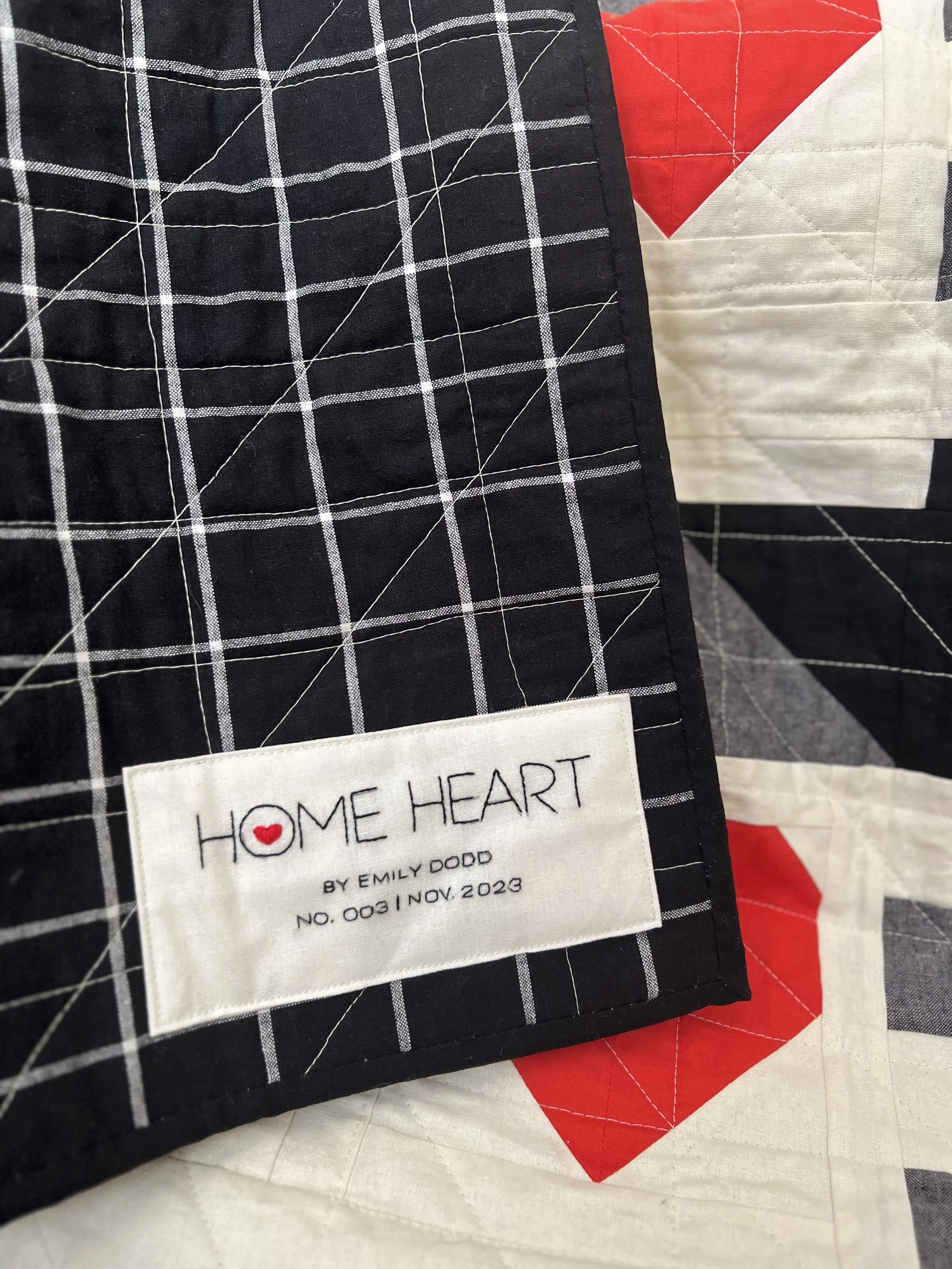 Hand embroidered label