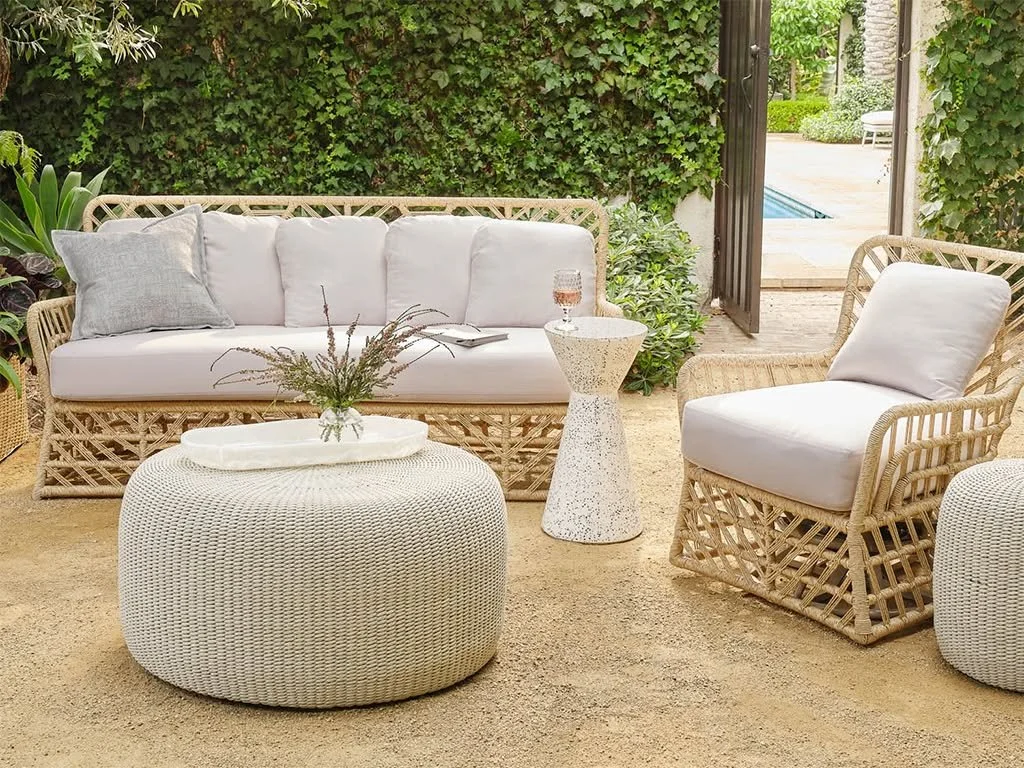 The Malindi Collection from @madegoods strikes the perfect balance of relaxed and refined. Twisted faux wicker curves into an intricate open-weave herringbone pattern, paired with cushions that keep seating cool and comfortable even in the summer hea