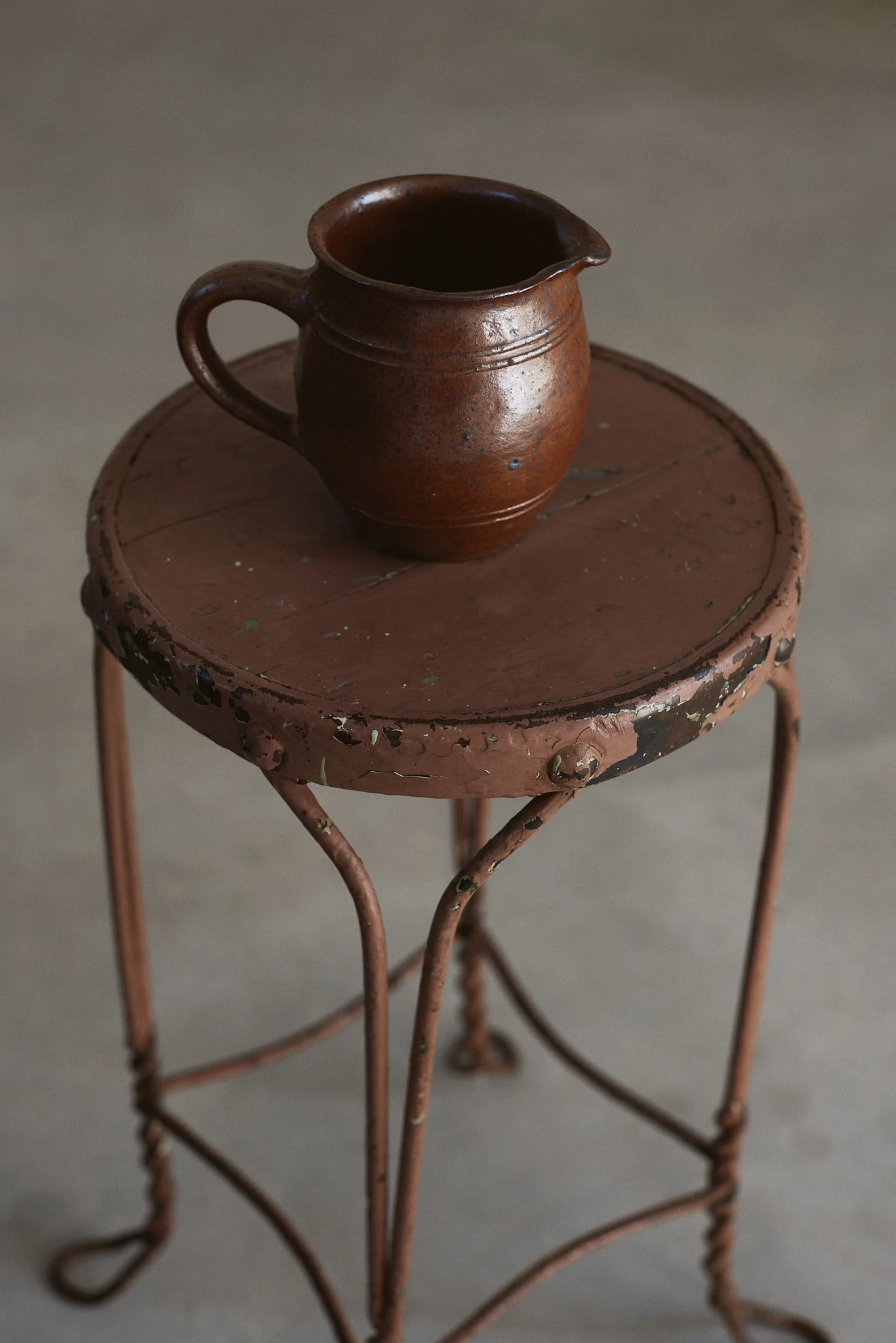 brown handle jug cup on stool.jpg