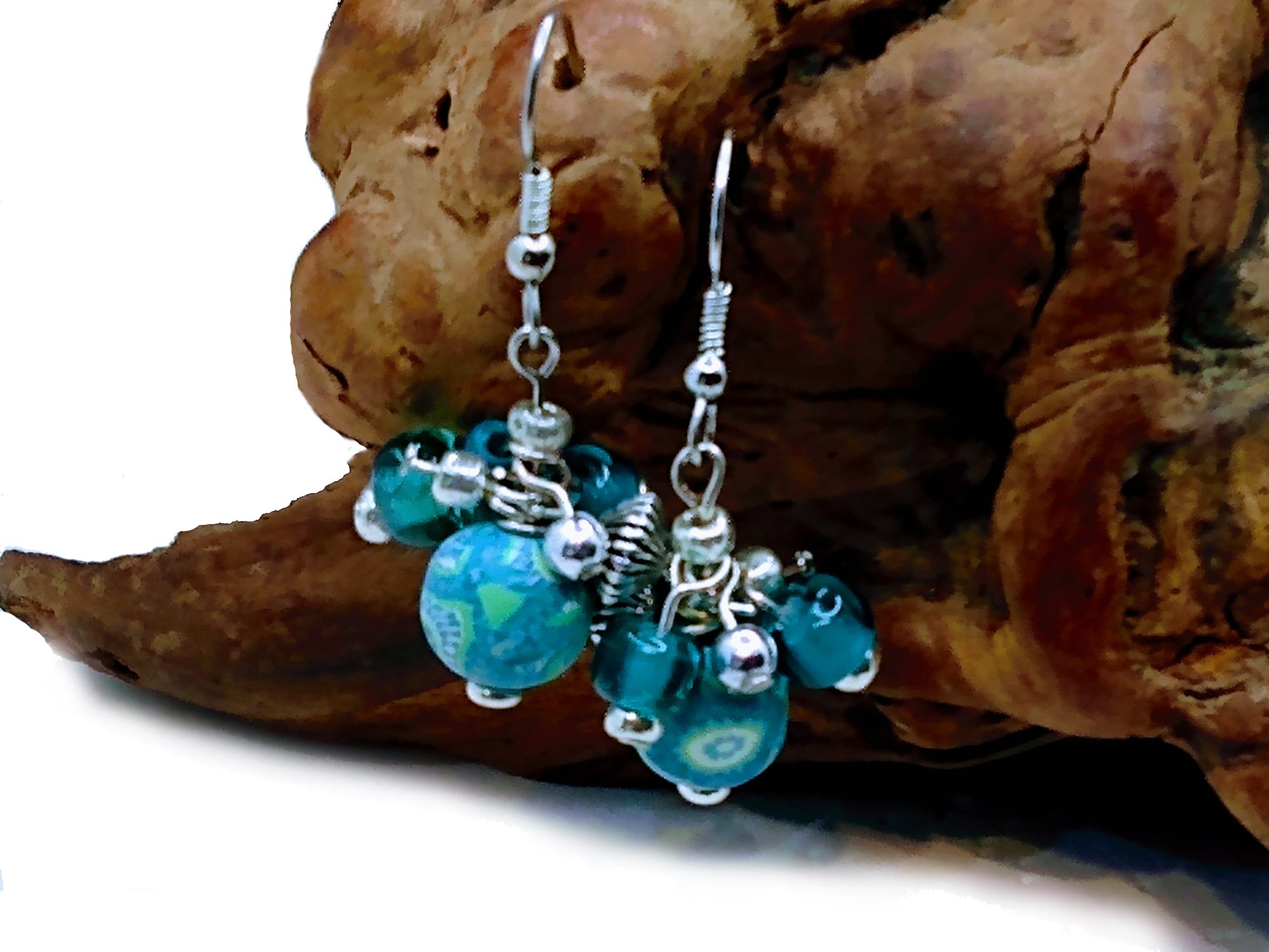 #542 Polyresin and Turquoise Glass Dangles