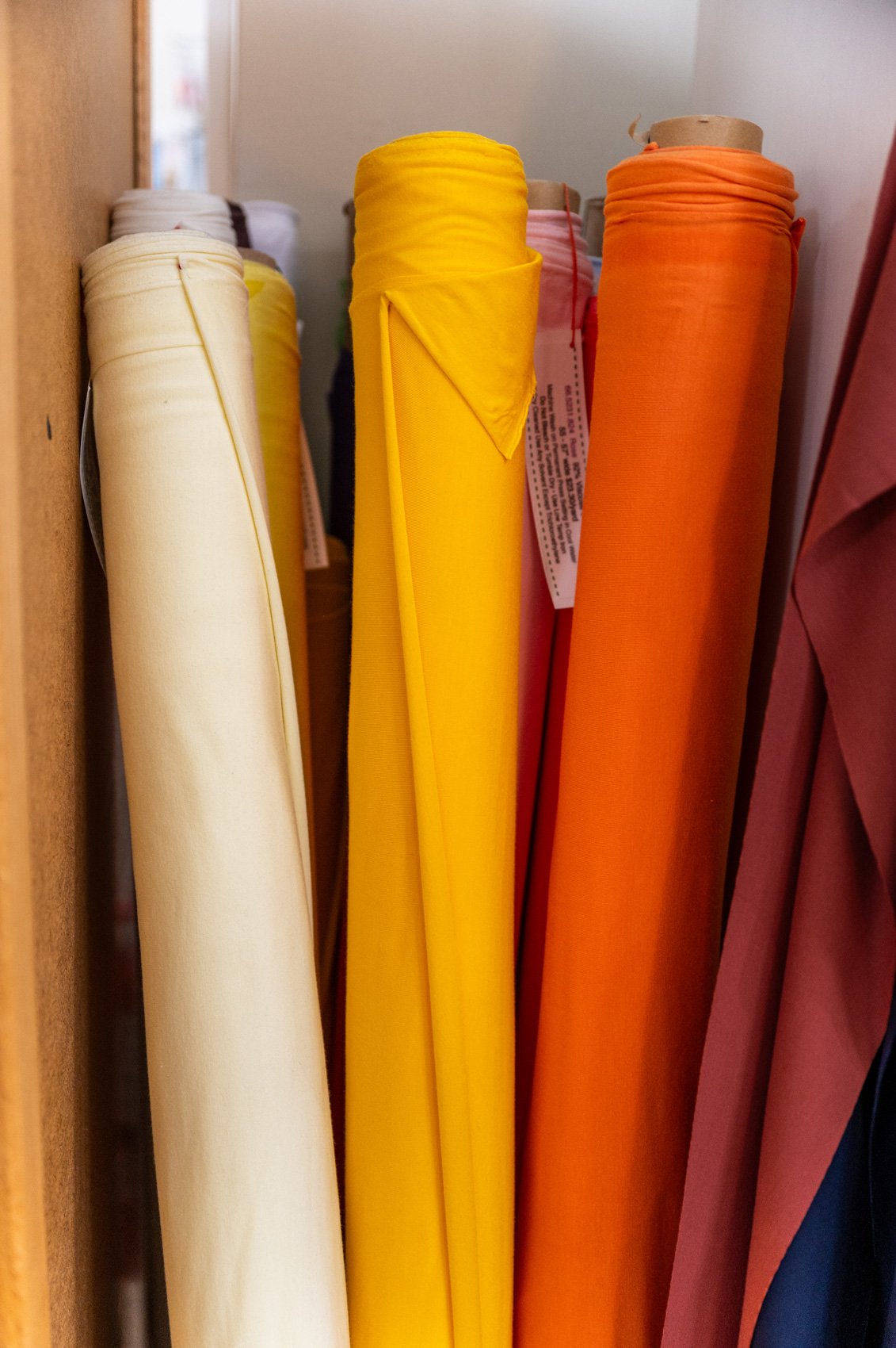 A wide variety of sewing fabric types, from cottons and linens to more specialized fabrics like silks, wools, denims, rayons, and knits.
