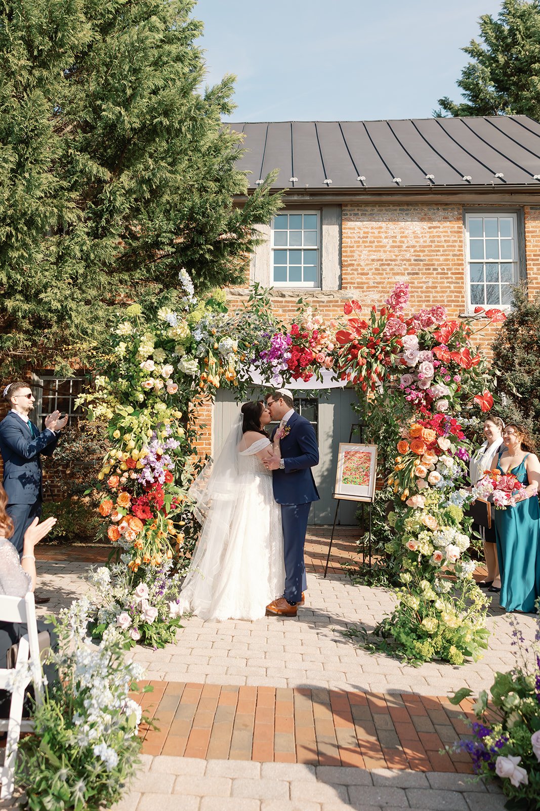 Maggie Morris Photography
The Birkby House, Leesburg VA
Colorful garden wedding florals chuppah ceremony